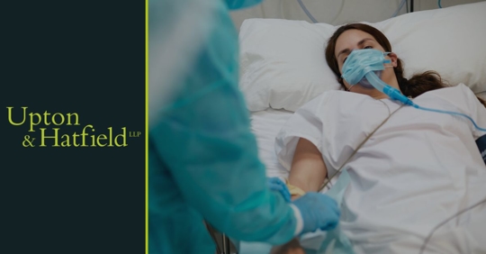 Lady in hospital bed